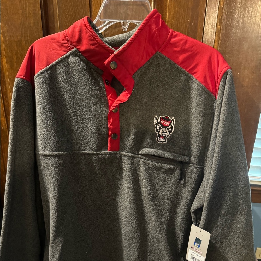 Brand New. With tags. NC State Wolfpack fleece pullover.